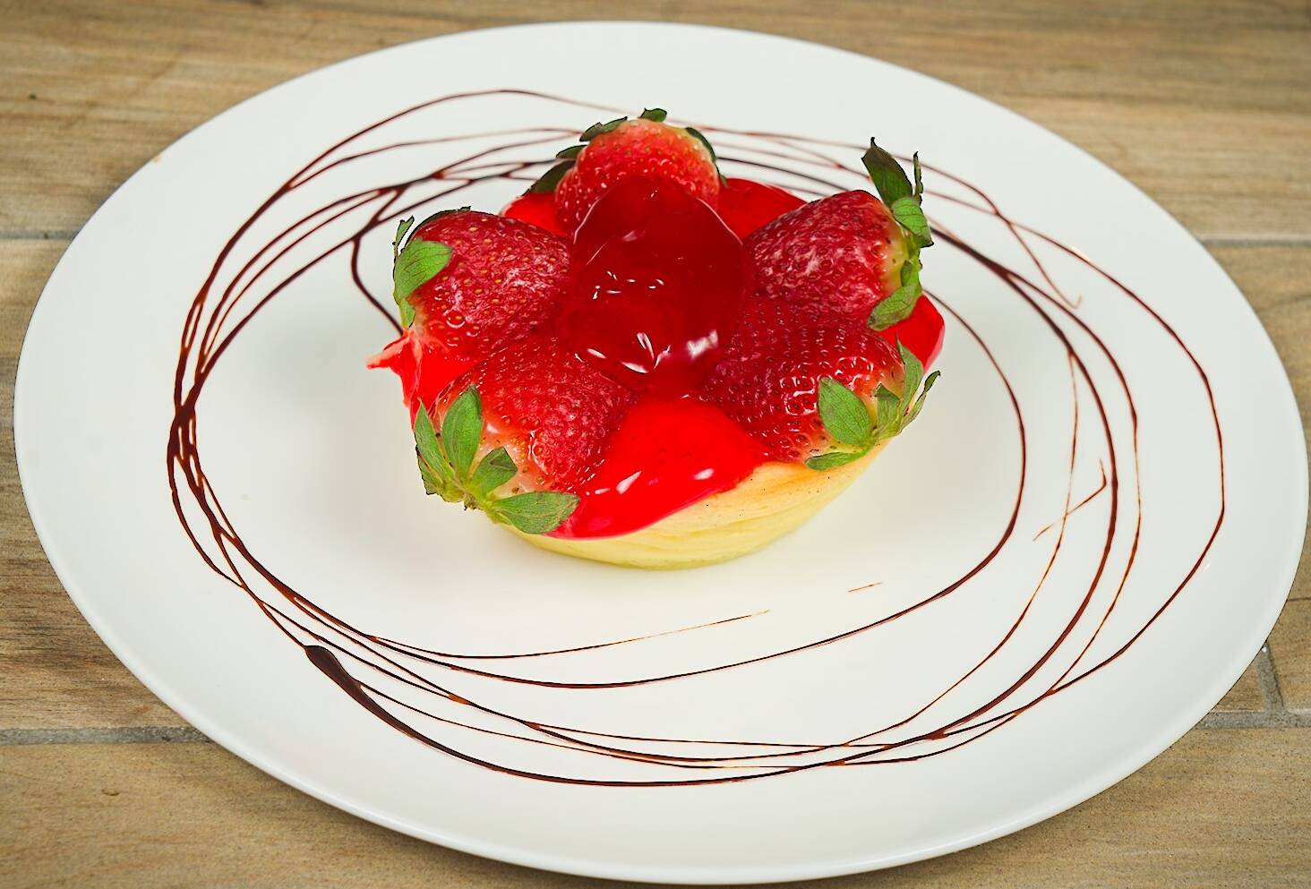 Strawberry cheesecake on a plate.