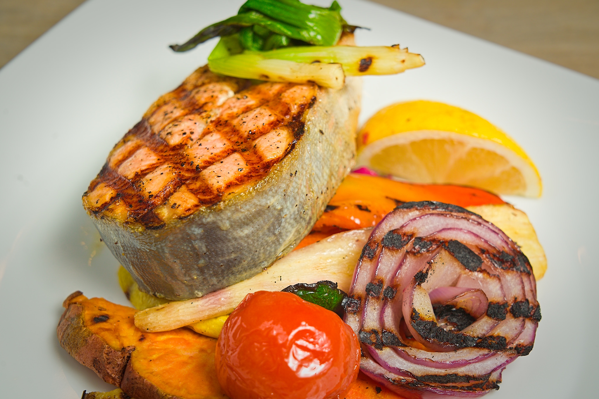 Grilled arctic char with a side of roasted vegetables