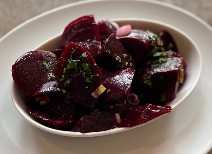 Roasted beets on a dish.